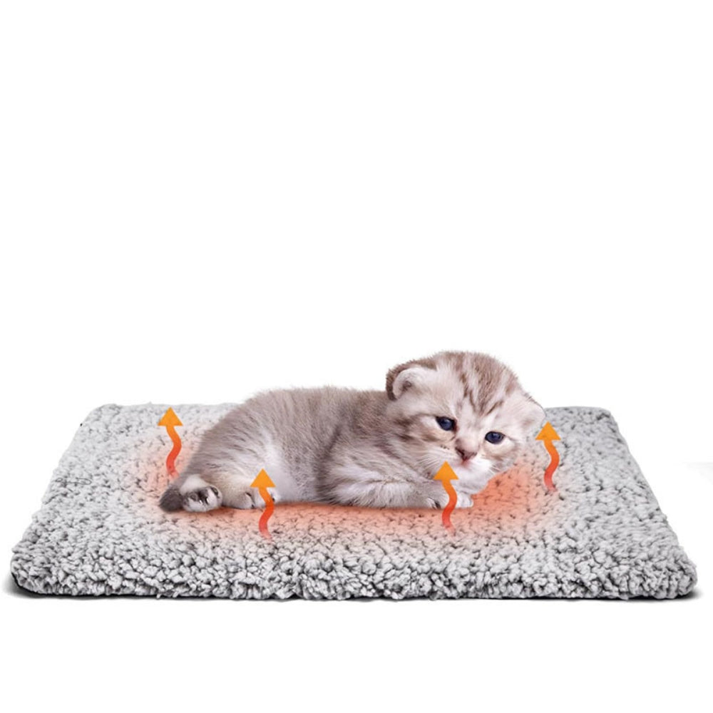 Cat resting on Heat Storage Waterproof Pet Heating Mat